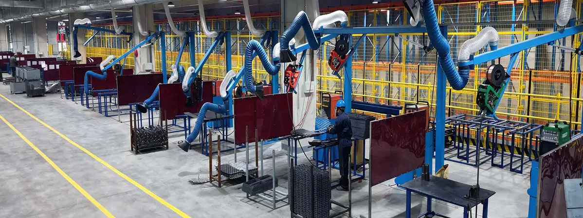Scaffolding welding workshop with fume extraction arms