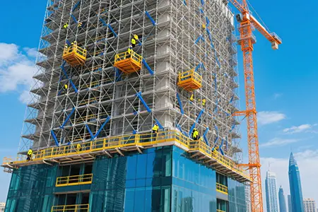 Scaffolding is being erected around the Burj Khalifa.